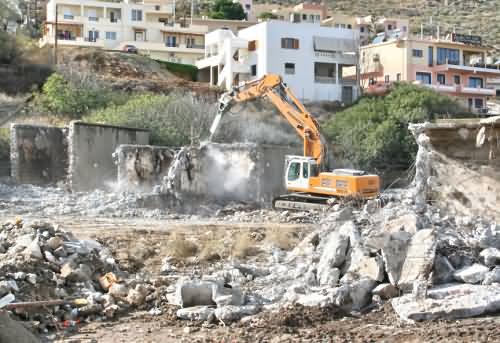 Mechanical chisels chop down buildings at Kolimbari Co-op, November 2008.