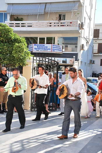 Chania, Crete. Aggeliki Rabouni arrives for her wedding to David Heffendehl.
