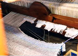 Crete. Weaving. Loom. Removing finished article.